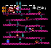 Donkey Kong for NES / Famicom - The game now repeats; using the hammer here to smash a barrel.