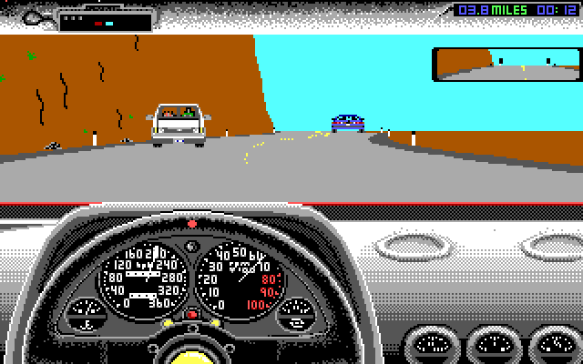 Duel: Test Drive II, The IBM PC/Compatibles Screenshot: Don't crash into the cliffs on this section of road...