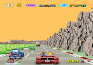 OutRun for Arcade - This stage has some rock walls on the sides of the road...