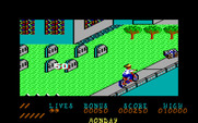 Paperboy for IBM PC/Compatibles - Earn points for hitting grave stones.