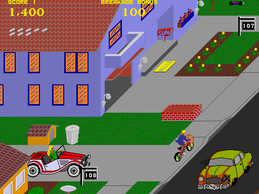 Paperboy Arcade Screenshot: Don't run into cars in the road...