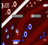 Paperboy for NES / Famicom - Avoid obstacles and hit targets for bonus points!