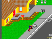 Paperboy for Sega Master System - Pick up newspaper bundles to replenish your supply.