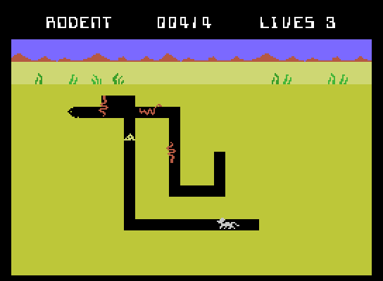 Evolution ColecoVision Screenshot: As a rodent, avoid the snakes!