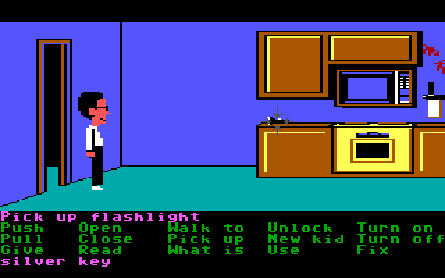 Maniac Mansion IBM PC/Compatibles Screenshot: Ah, a flashlight! This could be useful...
