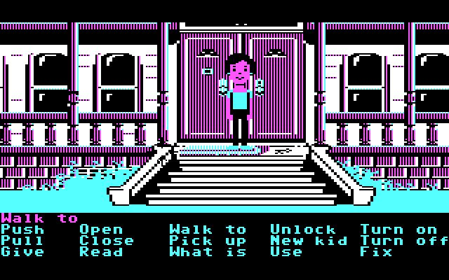 Maniac Mansion IBM PC/Compatibles Screenshot: A key is conveniently left under the doormat...