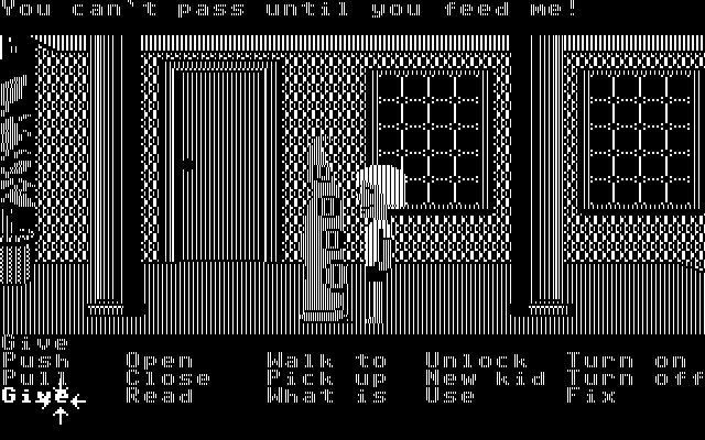 Maniac Mansion IBM PC/Compatibles Screenshot: You can't pass Green Tentacle unless you feed him.