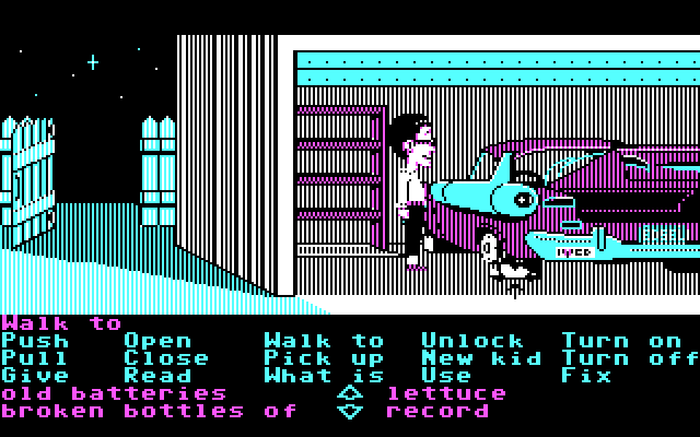 Maniac Mansion IBM PC/Compatibles Screenshot: A rather weird Edsel is in the garage.