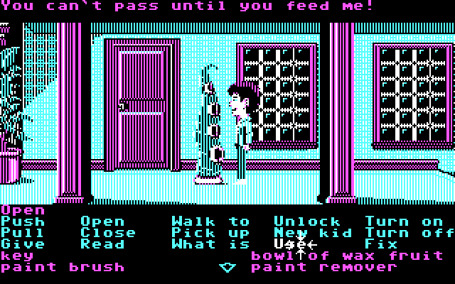 Maniac Mansion IBM PC/Compatibles Screenshot: Green Tentacle won't let you pass until you give him some food...