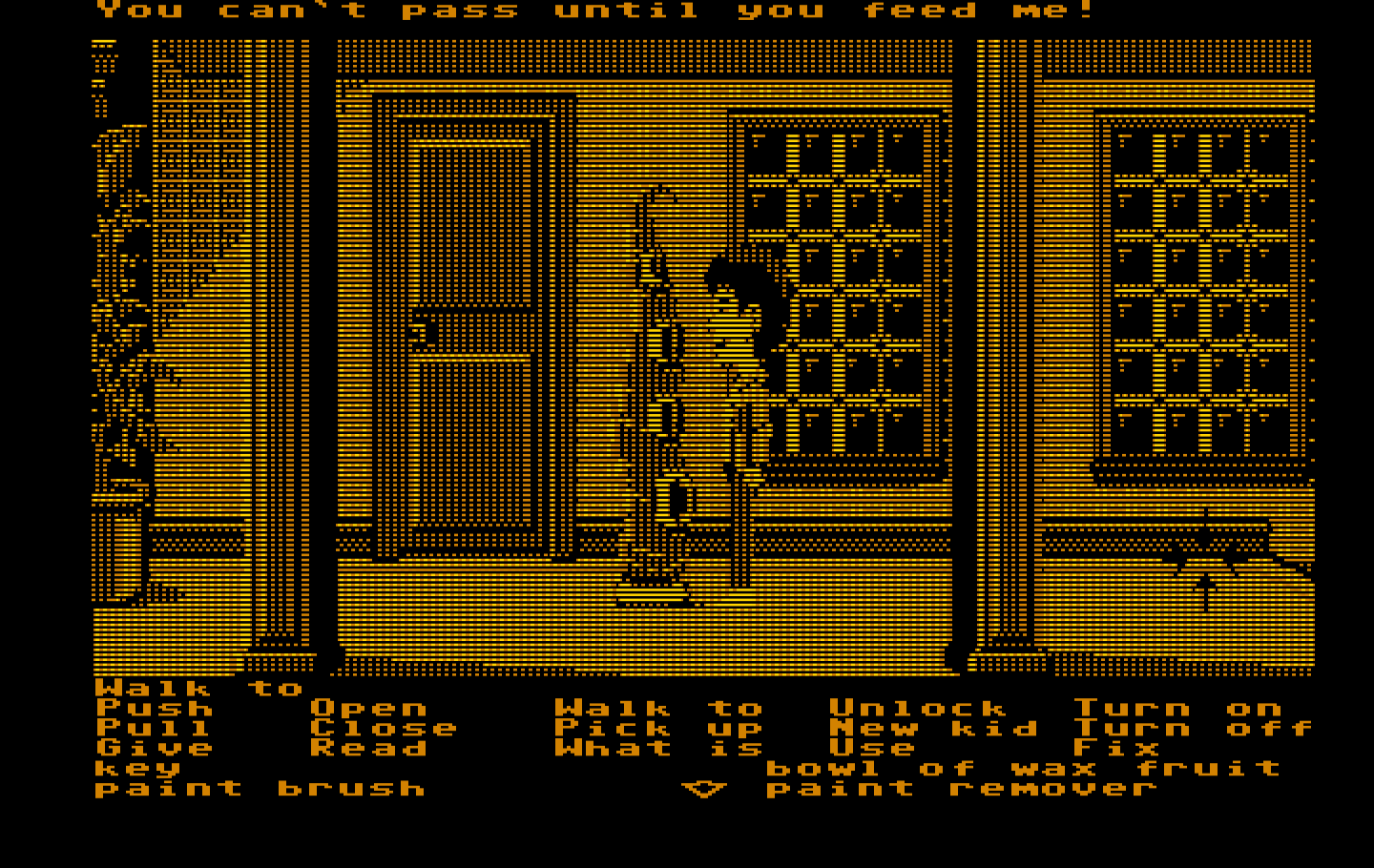 Maniac Mansion IBM PC/Compatibles Screenshot: Green tentacle won't let you pass unless you feed him.