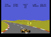 Pole Position II for Atari 7800 - Sharp turn, don't hit that sign on the side of the road...