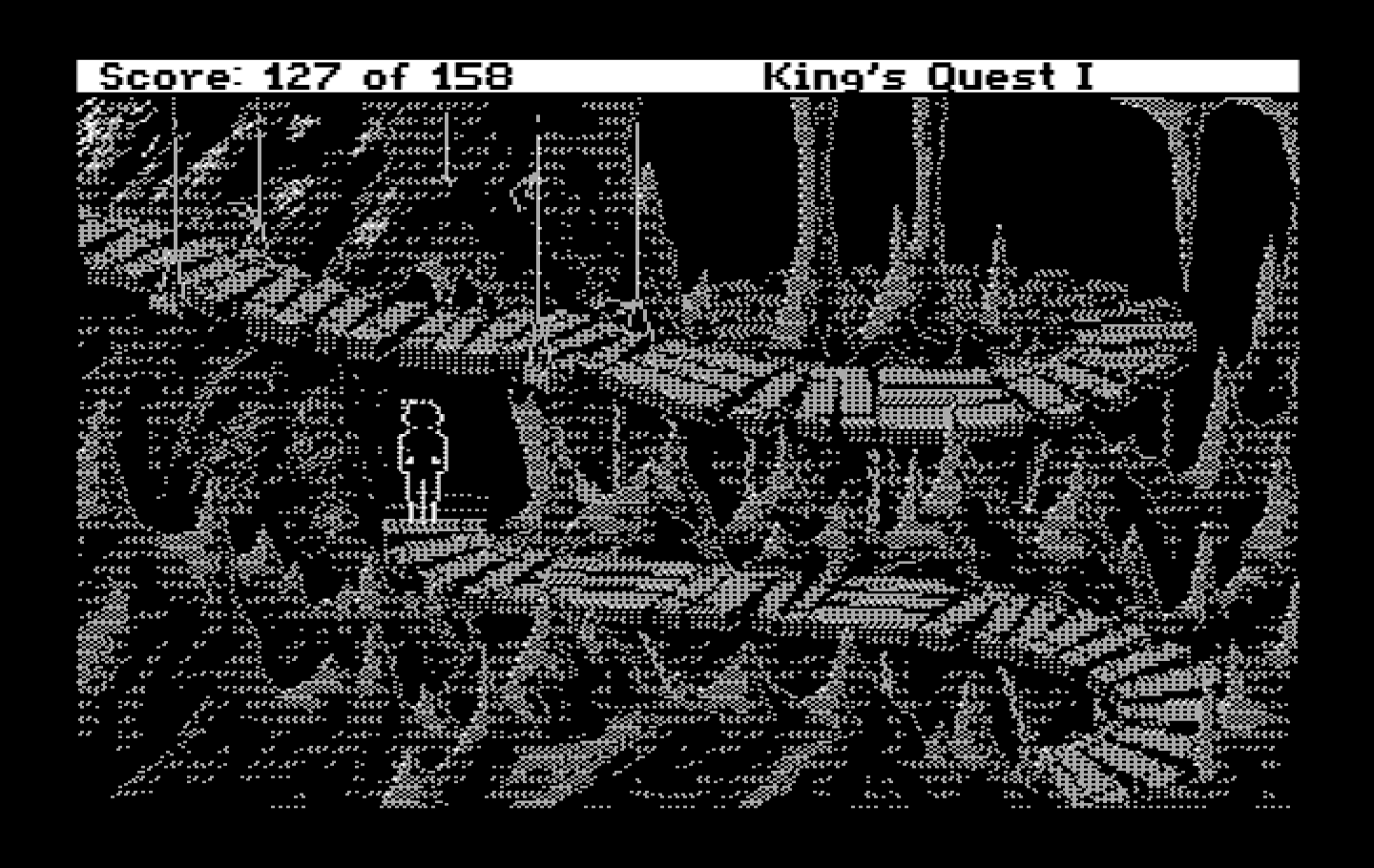 Roberta Williams' King's Quest I: Quest for the Crown IBM PC/Compatibles Screenshot: A magic ring made me invisible, now I need to escape by going down this long path.