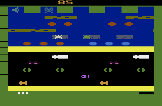 Frogger Atari 2600 Screenshot: If you can, catch the female frog (in white here) for bonus points.