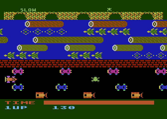 Frogger Atari 8-bit Screenshot: Frogger crossing the road...