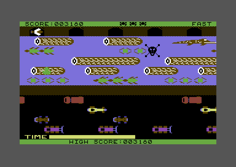 Frogger Commodore 64 Screenshot: Some turtles dive into the water...