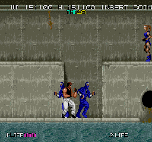 Bad Dudes vs. Dragon Ninja Arcade Screenshot: Don't fall into the water, jump up onto the platform...