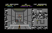 Contra for Commodore 64 - Shoot targets to continue through this corridor.