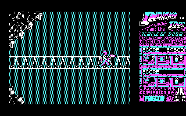 Indiana Jones and the Temple of Doom IBM PC/Compatibles Screenshot: Crossing the bridge; don't get hit by fireballs!