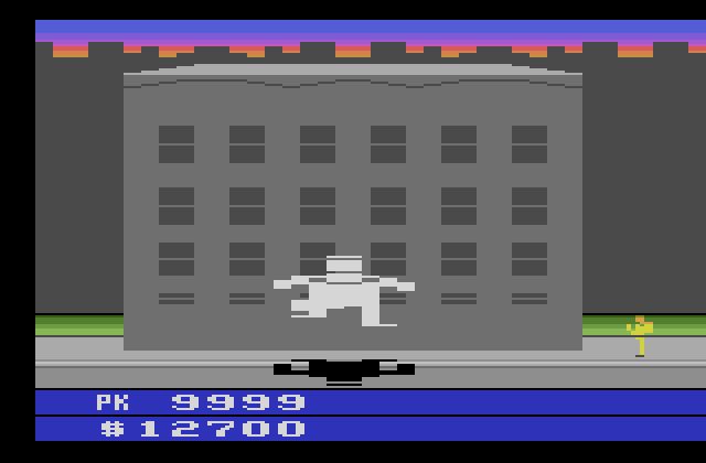Ghostbusters Atari 2600 Screenshot: The marshmallow man! Can you guide the Ghostbuster past him safely?