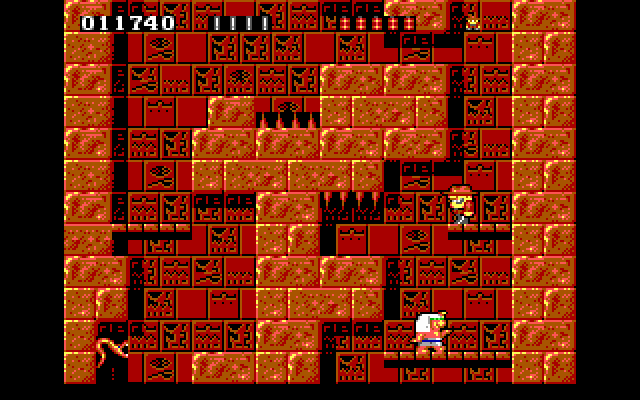 Rick Dangerous IBM PC/Compatibles Screenshot: Heading down by jumping on platforms...