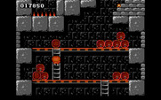 Rick Dangerous for IBM PC/Compatibles - Avoid the rolling barrels.