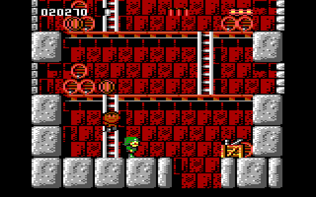 Rick Dangerous IBM PC/Compatibles Screenshot: Avoid the rolling barrels in this section of the game.