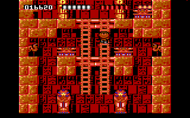 Rick Dangerous IBM PC/Compatibles Screenshot: Climbing up to the next platform...