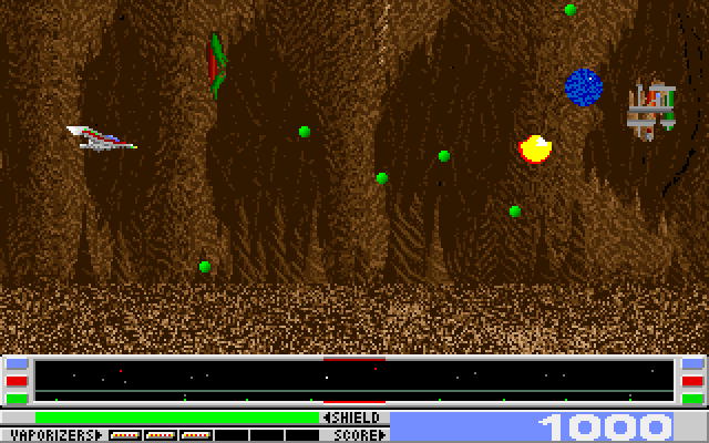 Revenge of Defender IBM PC/Compatibles Screenshot: Be sure to dodge the green bullets...