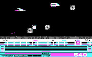 Revenge of Defender for IBM PC/Compatibles - The vehicle at the top of the screen leaves behind a shield replenishment when shot.