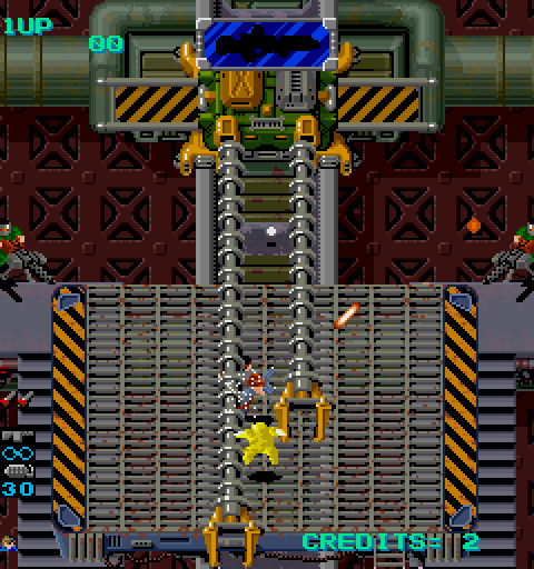 Heavy Barrel Arcade Screenshot: I'm hit! The end of the second level...