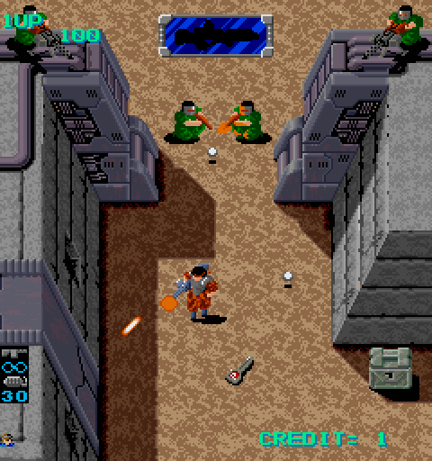 Heavy Barrel Arcade Screenshot: Fighting my way through a large door...
