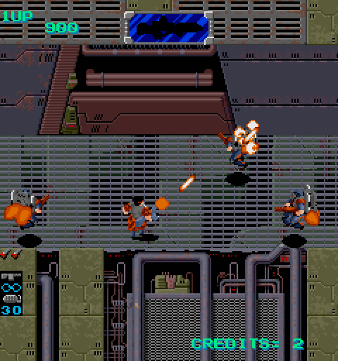 Heavy Barrel Arcade Screenshot: Attacking opponents in a narrow passage...
