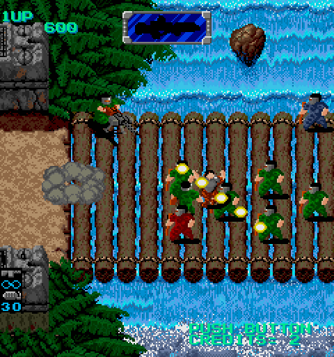 Heavy Barrel Arcade Screenshot: Crossing a dangerous bridge...