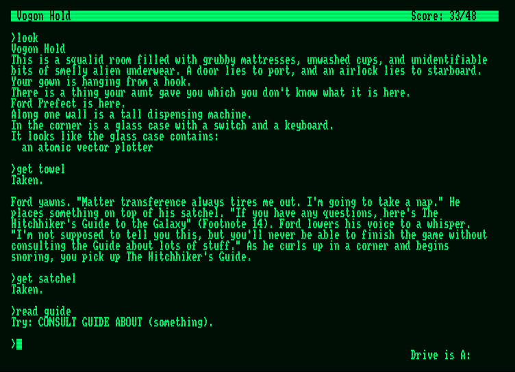 Hitchhiker's Guide to the Galaxy, The Amstrad PCW Screenshot: Once you acquire the guide you can consult it about many things.