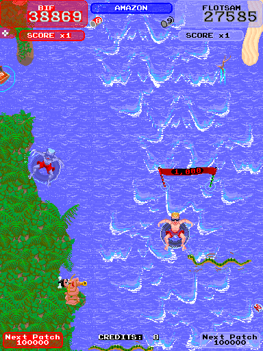Toobin' Arcade Screenshot: Avoid the snakes, they're deadly!