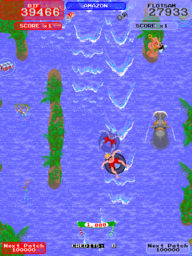 Toobin' Arcade Screenshot: This section of river has hippotatomuses and headhunters.