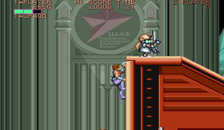 Strider Arcade Screenshot: Climbing my way up a wall...